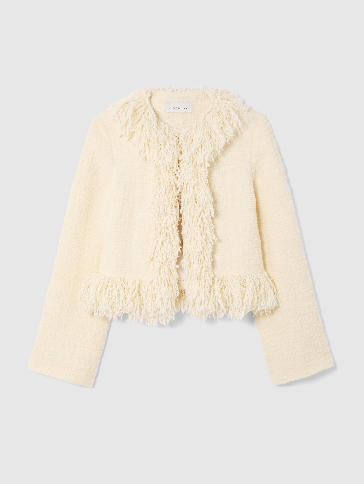 CROPPED FRINGE JACKET IN VANILLA CREAM