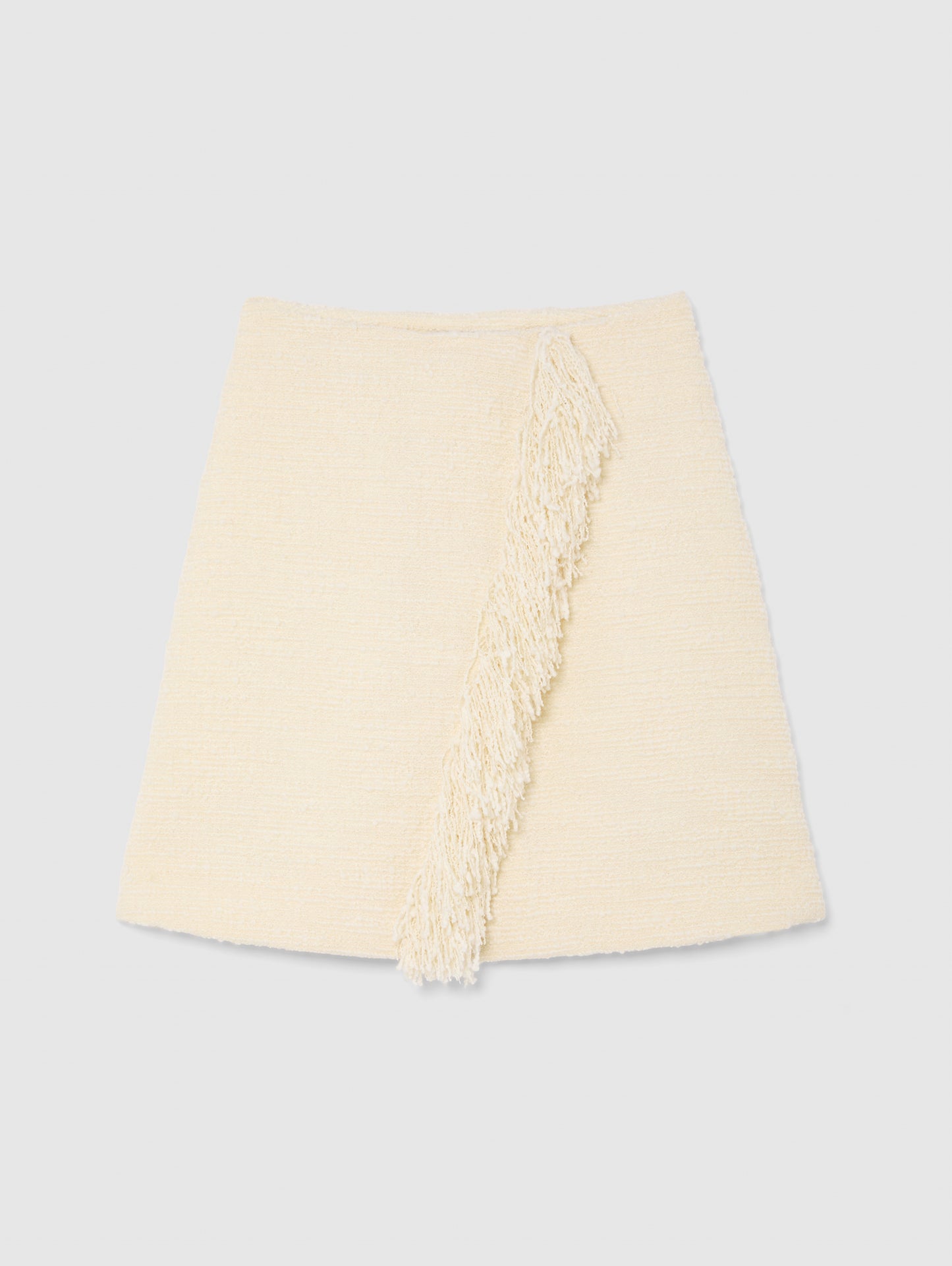 FRINGE SKIRT IN VANILLA CREAM
