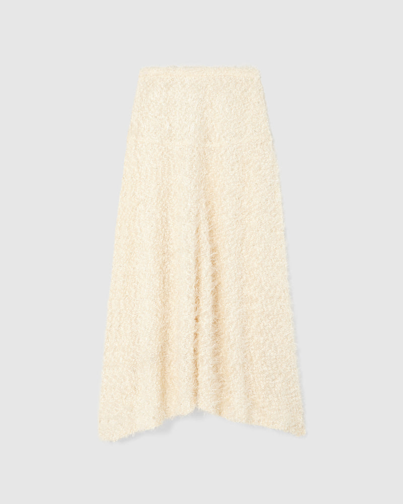 A lightweight knit skirt crafted from intricate chenille tweed, woven with plush pearl chenille and embellished with delicate silver beading. 
