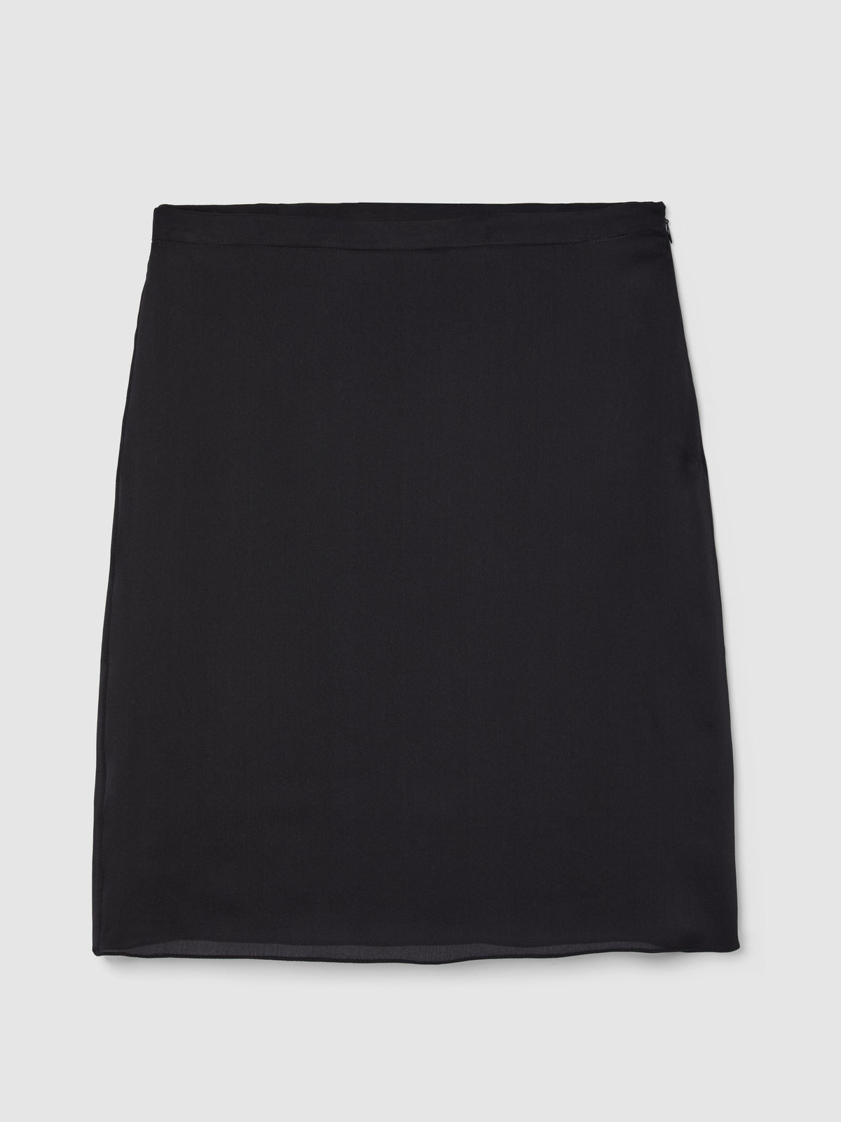 Designed in a sleek straight-cut silhouette, it sits elegantly at the waist with a narrow waistband and tailored darts for a clean, flattering shape. Perfect for elevated everyday and occasion dressing.