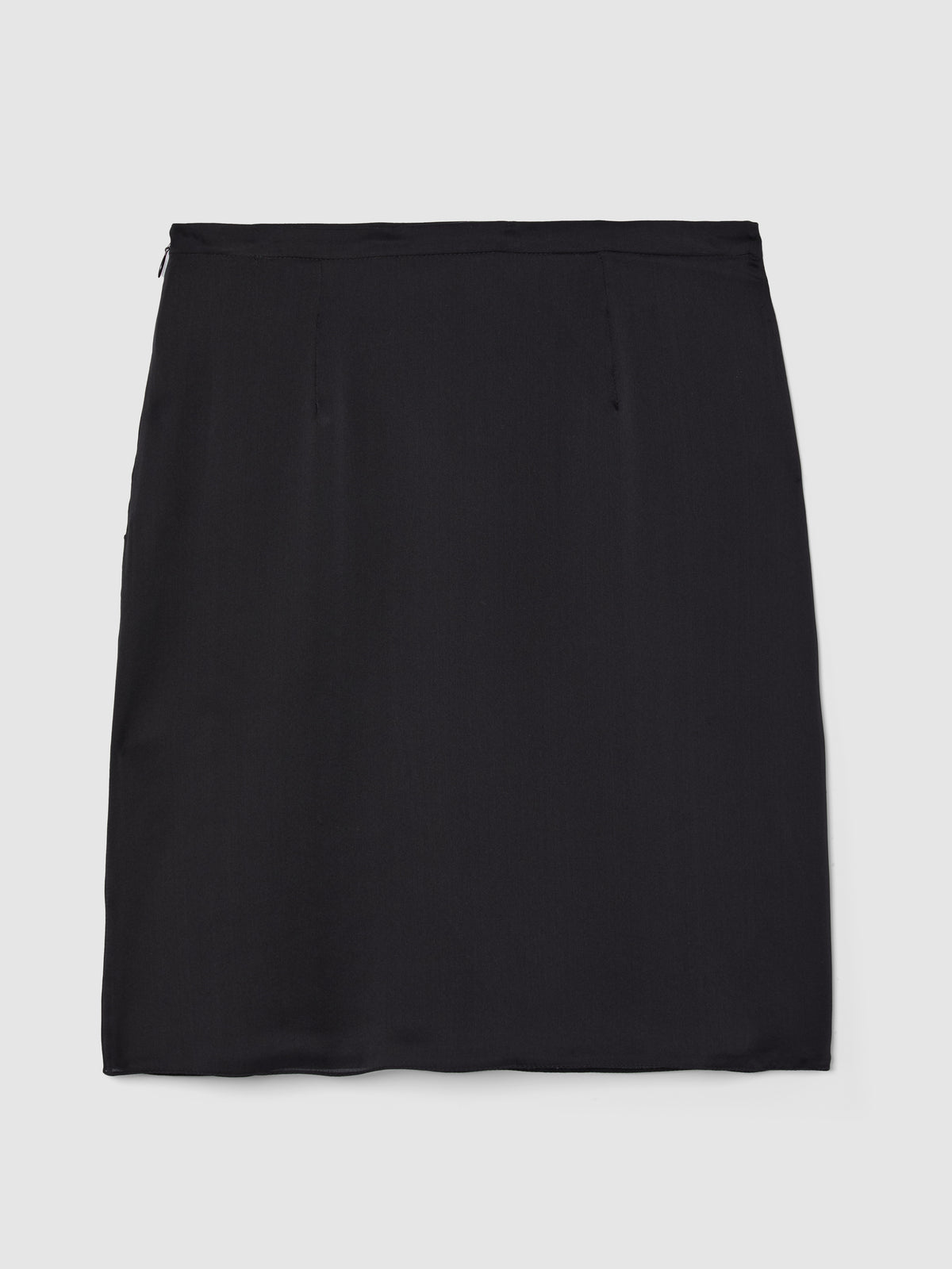 Designed in a sleek straight-cut silhouette, it sits elegantly at the waist with a narrow waistband and tailored darts for a clean, flattering shape. Perfect for elevated everyday and occasion dressing.