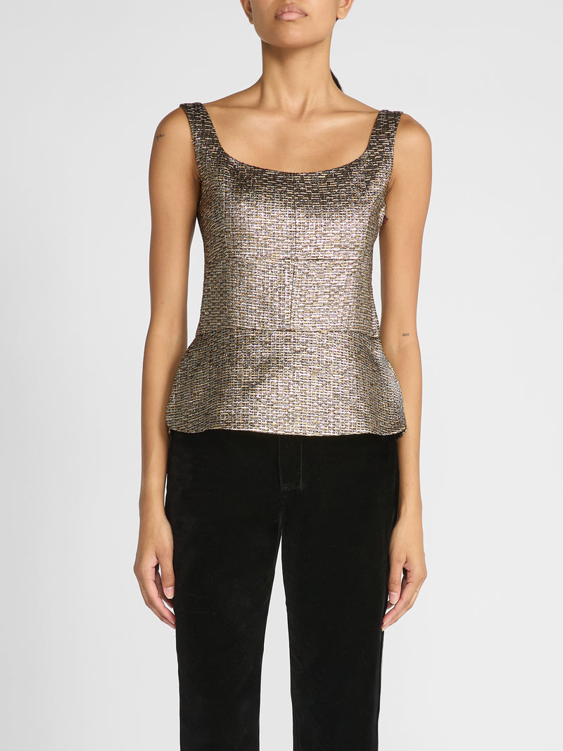 Crafted in luxurious mixed gold jacquard, this fitted sleeveless top features a structured, bustier-inspired bodice with defined bust seams for a sophisticated, feminine finish.