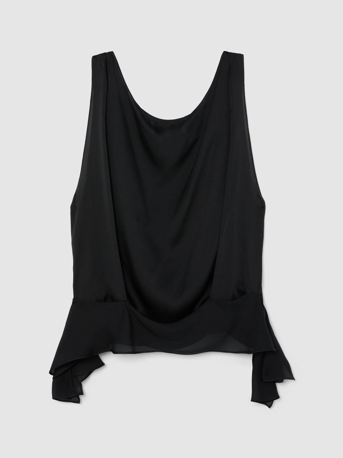 Crafted from fluid black silk, this sleeveless top features a softly draped bodice and elegant scoop neckline, creating a graceful, feminine silhouette.