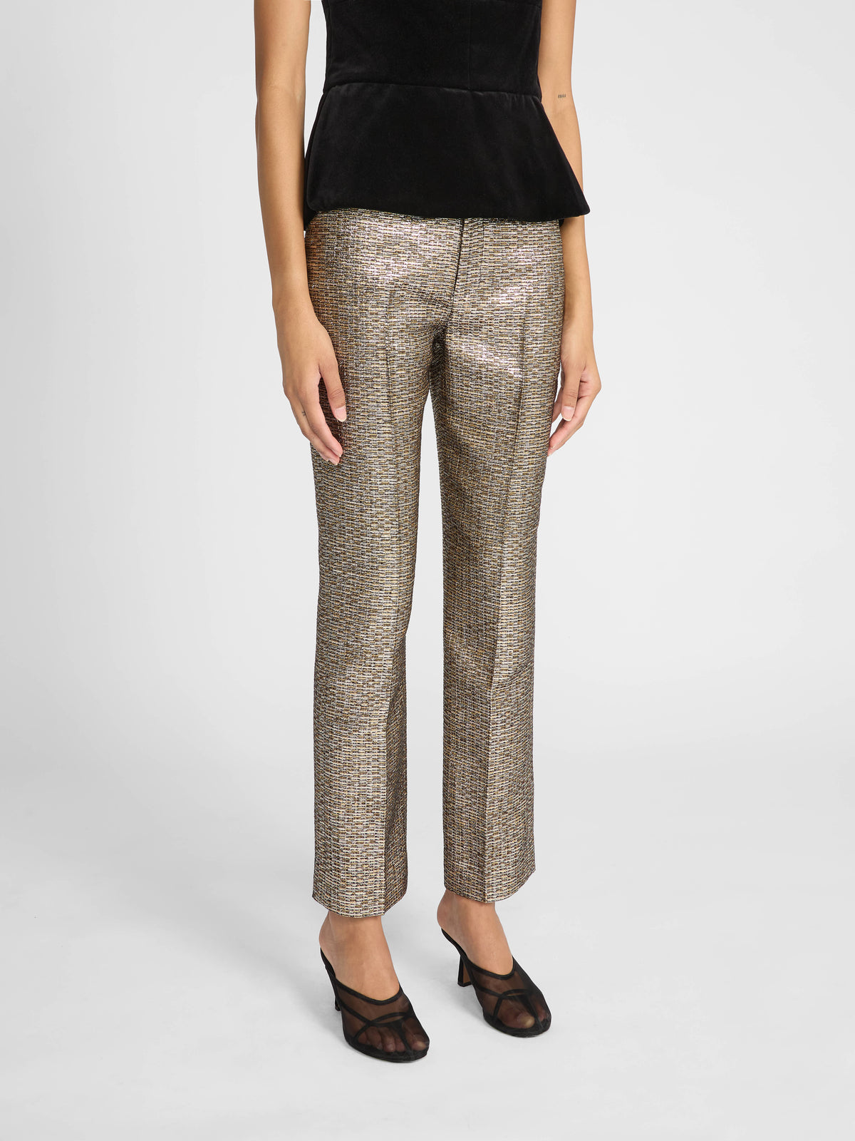 Crafted in textured jacquard, these slim-fit trousers feature an intricate metallic-speckled pattern in sophisticated gold tones.